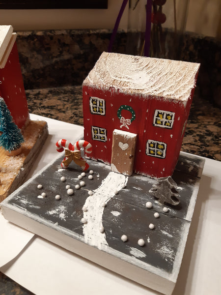 Miniature houses decorated for Christmas diorama